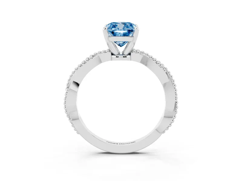 Fancy Blue Cushion Cut Diamond Solitaire Ring Set in Platinum with Twisted Band and Bead Prong Setting