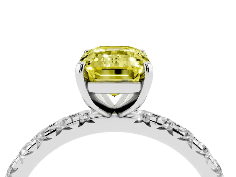 Fancy Yellow Emerald Cut Diamond Pavé Solitaire Ring Set in Platinum with Round Band and Prong Setting