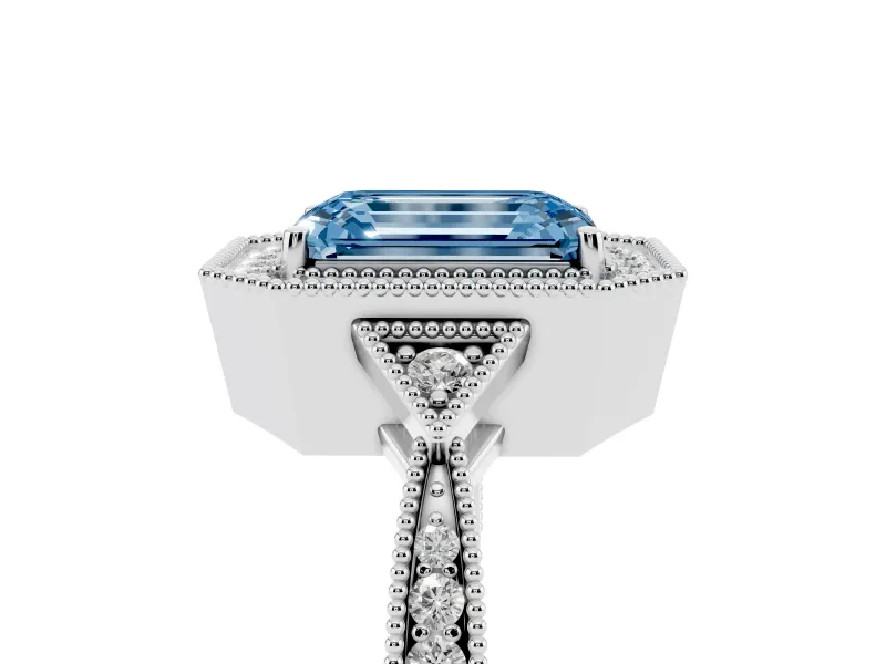 Fancy Blue Emerald Cut Diamond Halo Engagement Ring Set in White gold with Milgrain Pavé Band