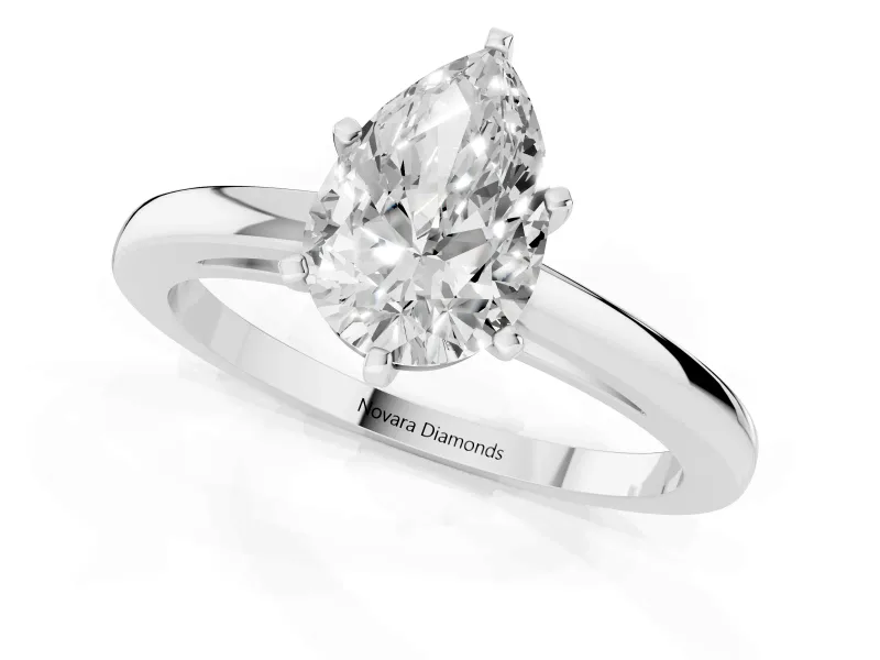 Pear Cut Diamond Solitaire Engagement Ring Set in White gold with Prong Setting on a Classic Band