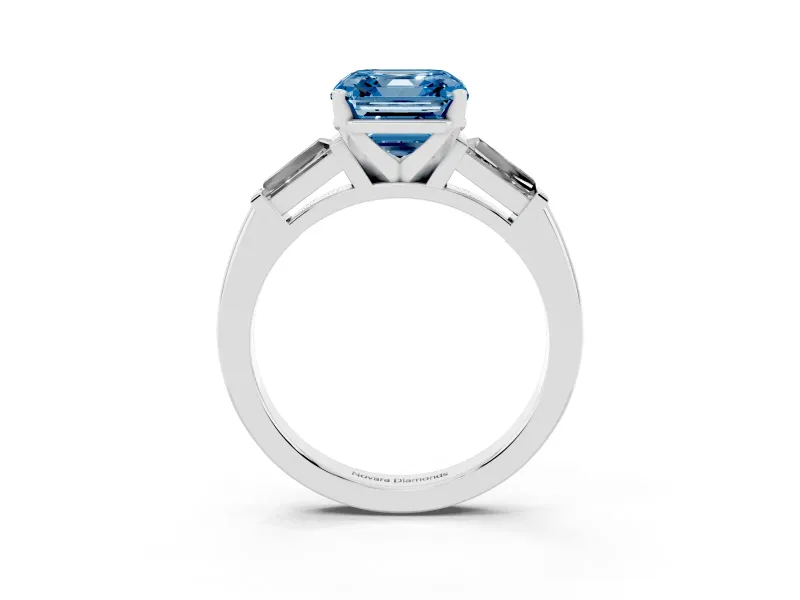 Fancy Blue Asscher Cut Diamond Solitaire Ring Set in White gold with Tapered Baguette Side Stones and Prong Setting