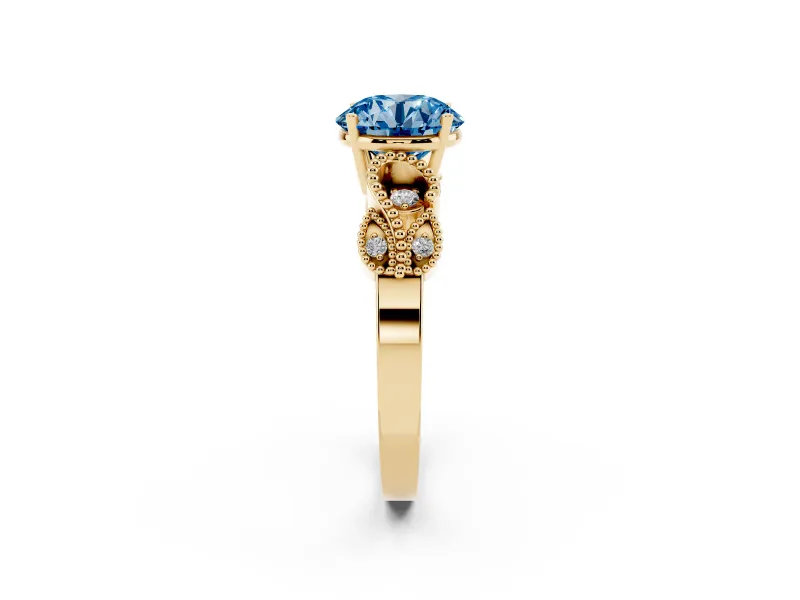 Fancy Blue Round Cut Diamond Milgrain Leaf Band Solitaire Ring Set in Yellow gold with Accent Stones and Prong Setting