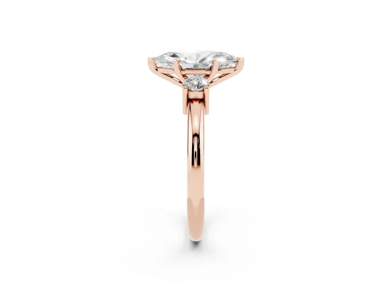 Three-Stone Marquise Cut Diamond Ring Set in Rose gold with Prong Setting and Plain Band