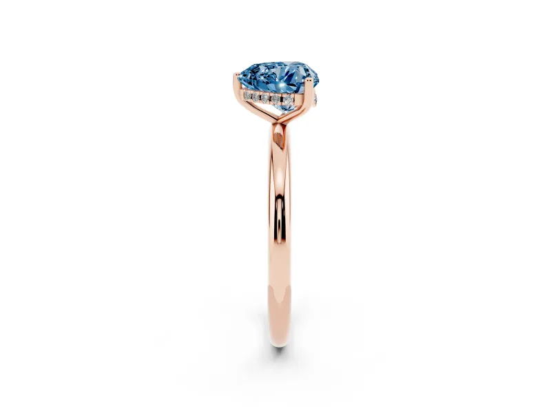 Fancy Blue Heart Cut Diamond Solitaire Engagement Ring Set in Rose gold with Prong Setting and Polished Band