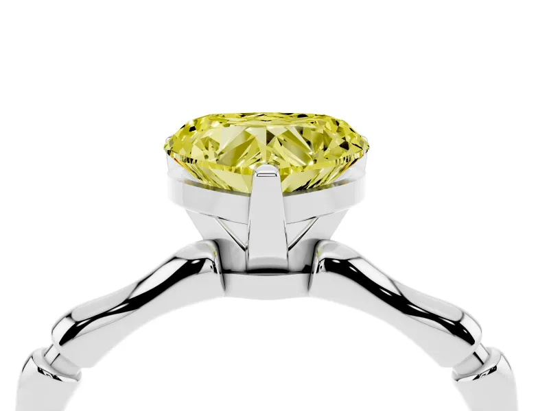 Fancy Yellow Heart Cut Diamond Solitaire Ring Set in Platinum with Bamboo Band and Prong Setting