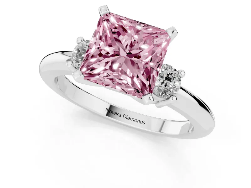 Fancy Pink Three-Stone Princess Cut Diamond Ring Set in White gold with Prong Setting and Plain Band