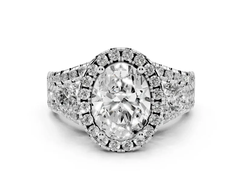 Oval Cut Diamond Halo Split Shank Ring Set in White gold with Round Accent Stones and Prong Setting
