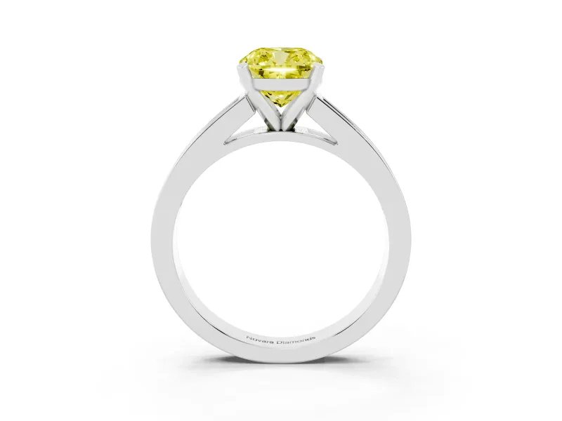 Fancy Yellow Cushion Cut Diamond Solitaire Ring Set in White gold with Channel-Set Band and Prong Setting