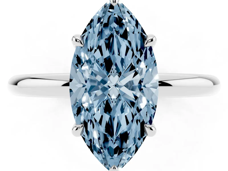 Fancy Blue Marquise Cut Diamond Solitaire Ring Set in White gold with Thin Band and Prong Setting