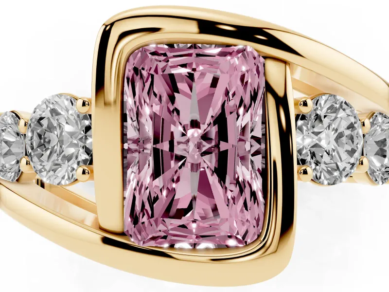 Fancy Pink Radiant Cut Diamond Bezel Bypass Ring Set in Yellow gold with Round Accents