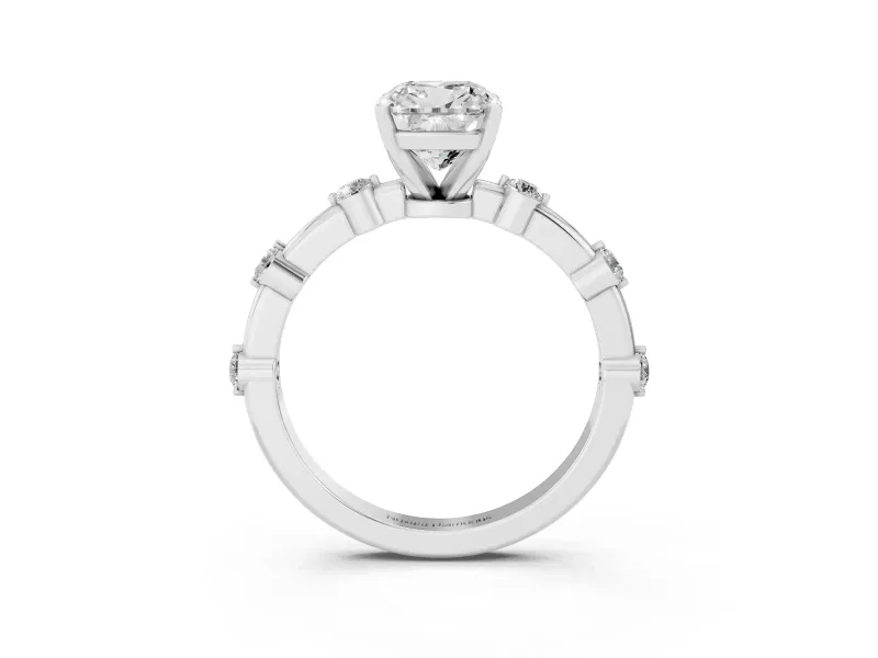 Cushion Cut Diamond Solitaire Ring Set in Platinum with Bezel Set Side Stones and Prong Setting