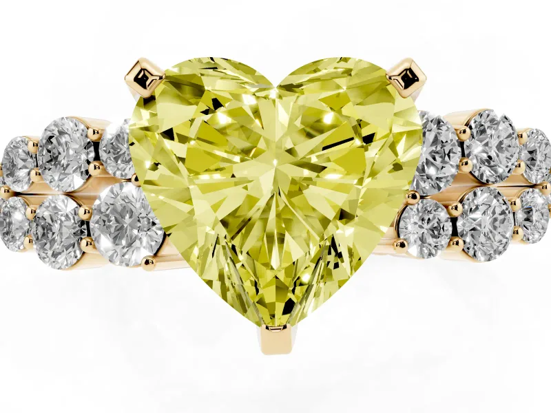 Fancy Yellow Heart Cut Diamond Cluster Engagement Ring Set in Yellow gold with Pavé Band and Prong Setting
