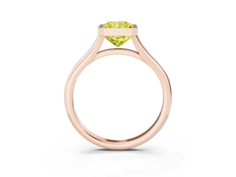 Fancy Yellow Bezel Set Radiant Cut Diamond Solitaire Ring Set in Rose gold with Tapered Band