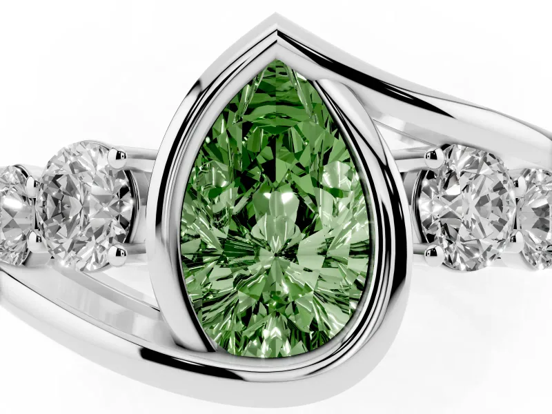 Fancy Green Pear Cut Diamond Bezel Bypass Ring Set in White gold with Round Accents