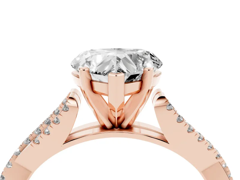 Heart Cut Diamond Solitaire Engagement Ring Set in Rose gold with Twisted Pavé Band and Prong Setting