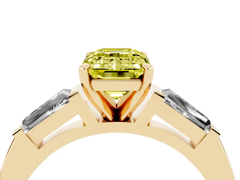 Fancy Yellow Emerald Cut Diamond Solitaire Ring Set in Yellow gold with Tapered Baguette Side Stones and Prong Setting
