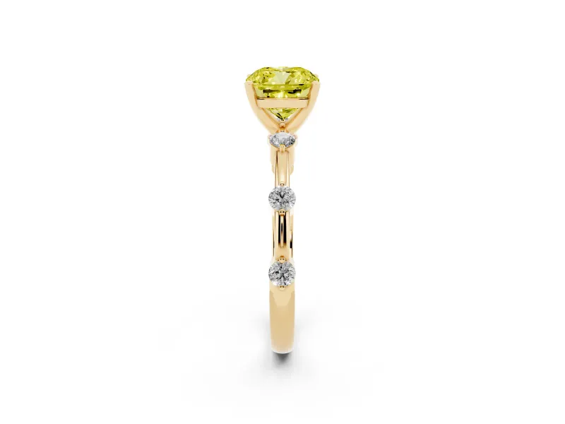 Fancy Yellow Cushion Cut Diamond Solitaire Ring Set in Yellow gold with Bezel Set Side Stones and Prong Setting