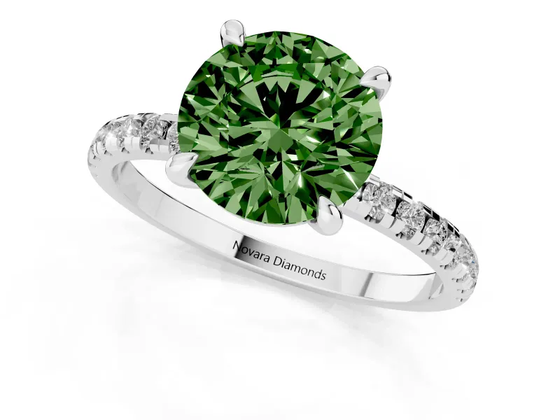 Fancy Green Round Cut Diamond Brilliant Solitaire Ring Set in White gold with Pavé Band and Prong Setting