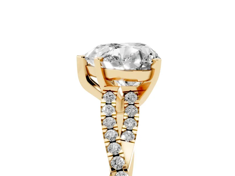 Heart Cut Diamond Solitaire Engagement Ring Set in Yellow gold with Twisted Pavé Band and Prong Setting