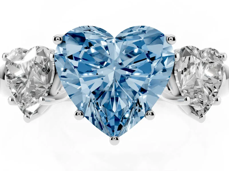 Fancy Blue Heart Cut Diamond Three-Stone Ring Set in Platinum with Bold Center and Classic Band