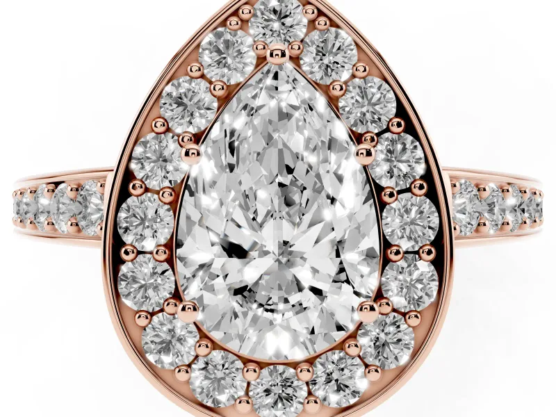 Pear Cut Diamond Halo Pavé Engagement Ring Set in Rose gold with Bezel Setting