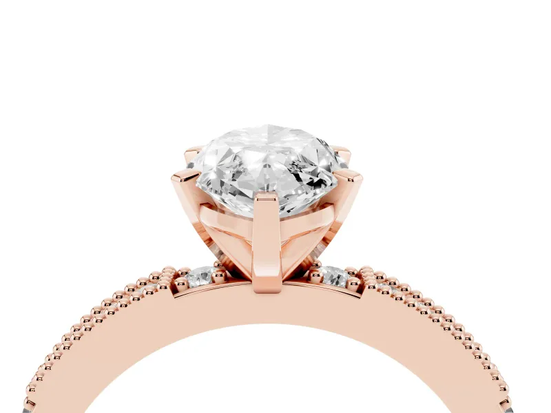 Marquise Cut Diamond Solitaire Ring Set in Rose gold with Slim Pavé Band and Prong Setting