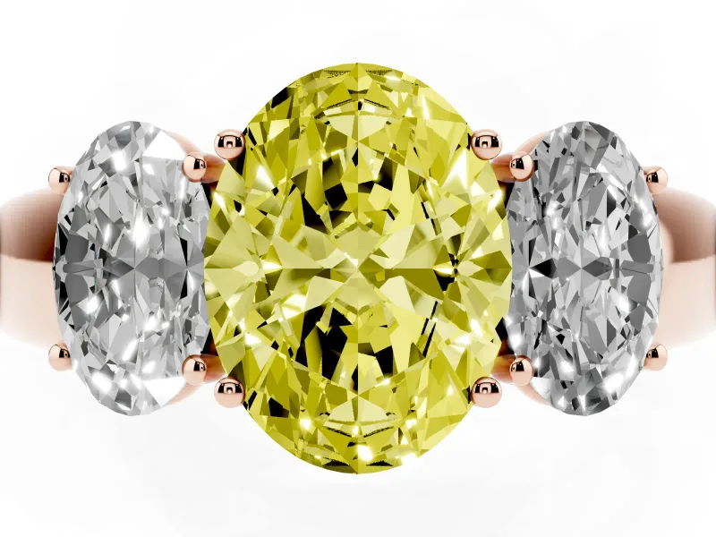 Fancy Yellow Three-Stone Oval Cut Diamond Ring Set in Rose gold with Matching Prong Settings and Plain Band