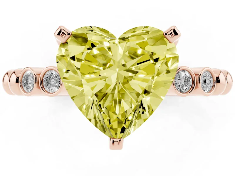 Fancy Yellow Heart Cut Diamond Solitaire Engagement Ring Set in Rose gold with Bezel Accents on Beaded Band