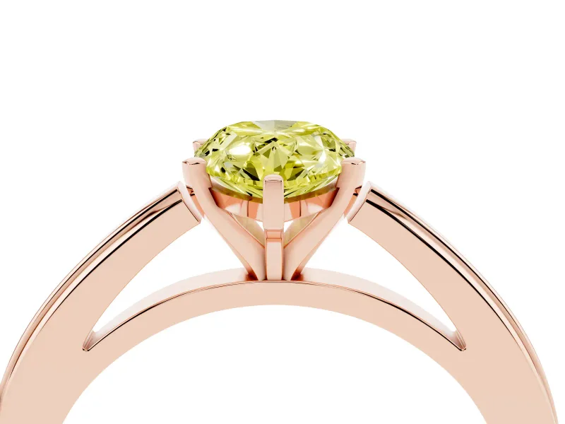 Fancy Yellow Pear Cut Diamond Solitaire Ring Set in Rose gold with Prong Setting and Classic Band