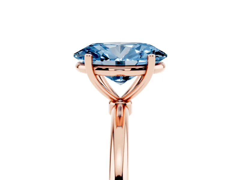 Fancy Blue Oval Cut Diamond Solitaire Engagement Ring Set in Rose gold with Thin Band and Prong Setting