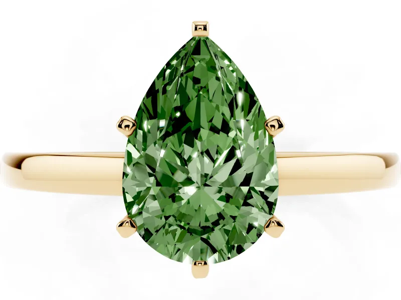 Fancy Green Pear Cut Diamond Solitaire Engagement Ring Set in Yellow gold with Prong Setting on a Classic Band