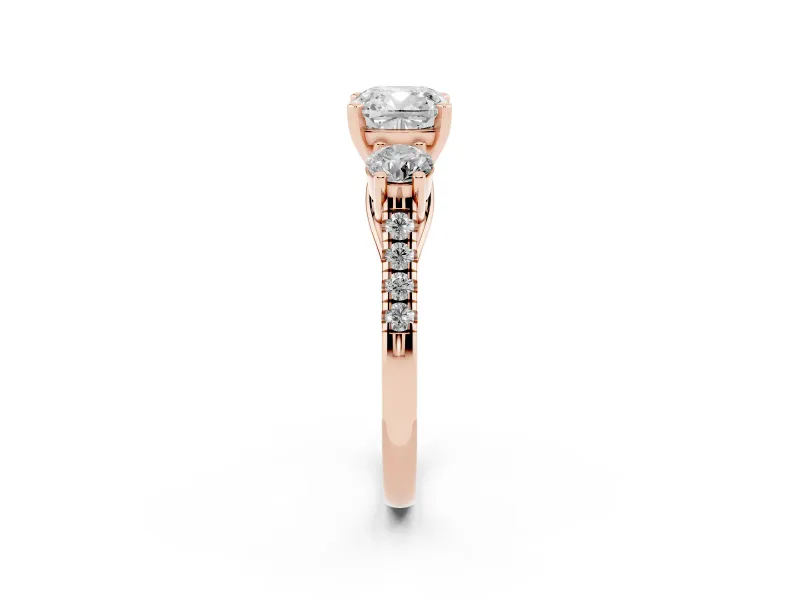 Cushion Cut Three-Stone Pavé Engagement Ring Setting | Round Side Stones | Rose Gold