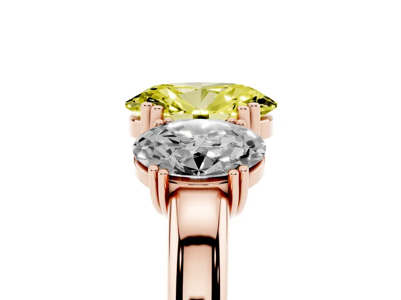 Fancy Yellow Oval Cut Diamond Three-Stone Ring Set in Rose gold with Polished Band and Prong Setting