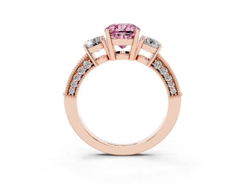 Fancy Pink Cushion Cut Diamond Three-Stone Ring Set in Rose gold with Round Side Stones and Pavé Band