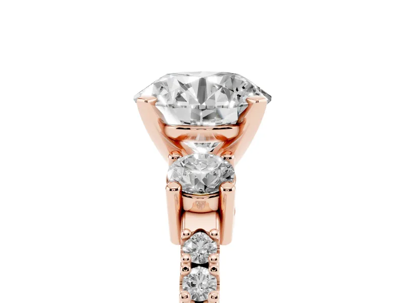 Three-Stone Round Cut Diamond Pavé Band Ring Set in Rose gold with Prong Setting