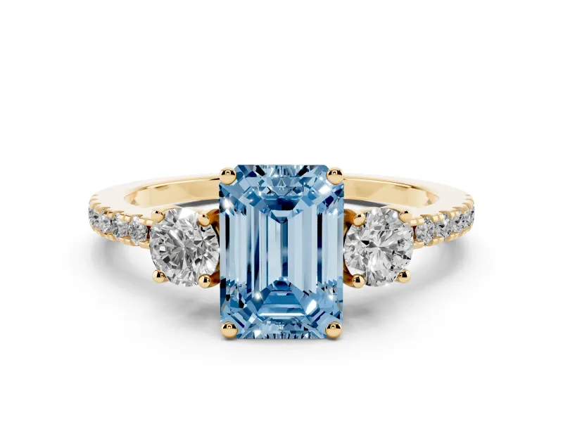 Fancy Blue Emerald Cut Diamond Three-Stone Ring Set in Yellow gold with Pavé Band and Graduated Sides