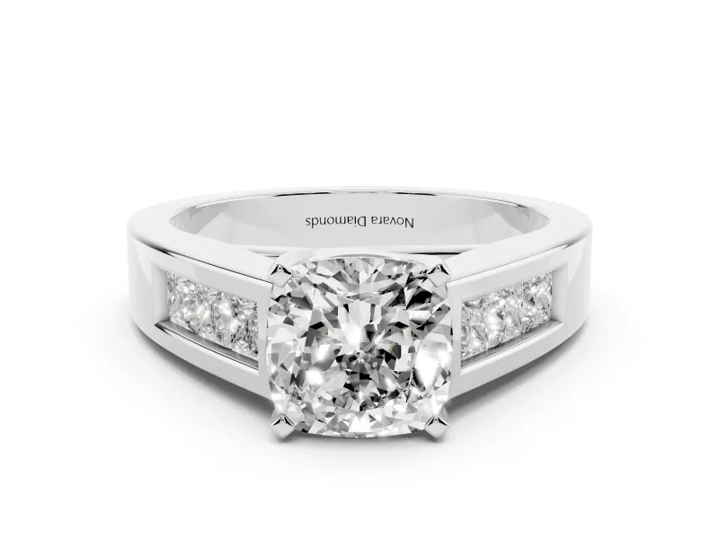 Cushion Cut Diamond Solitaire Ring Set in Platinum with Channel-Set Accent Stones and Prong Setting