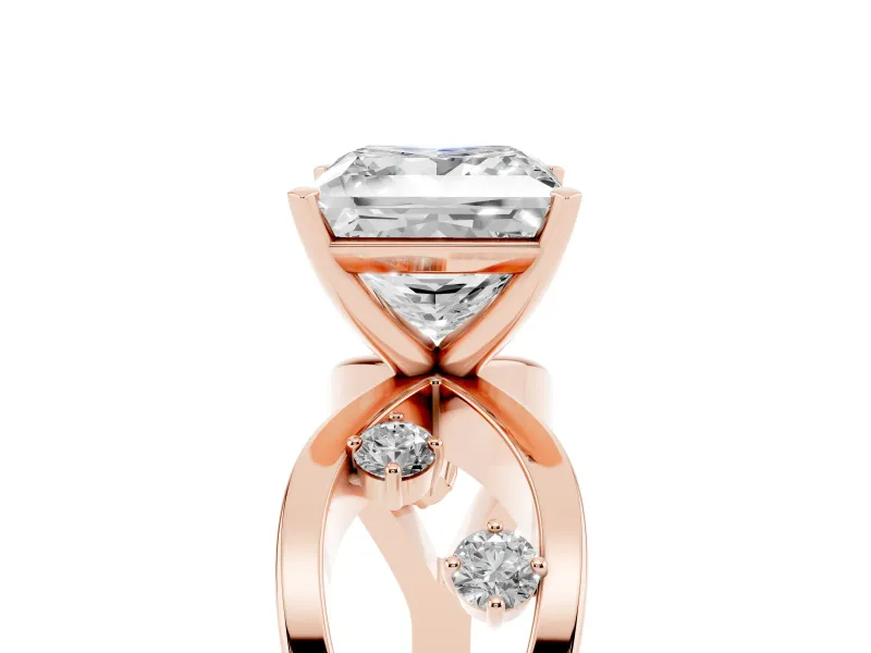 Princess Cut Diamond Solitaire Ring Set in Rose gold with Side Stones on Criss-Cross Band and Prong Setting