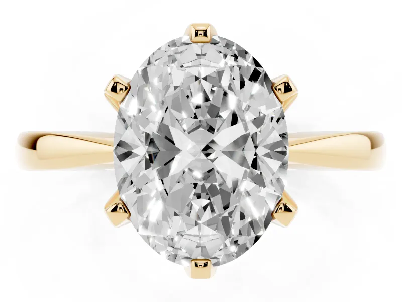 Oval Cut Diamond Solitaire Engagement Ring Set in Yellow gold with Slim Tapered Solitaire Band