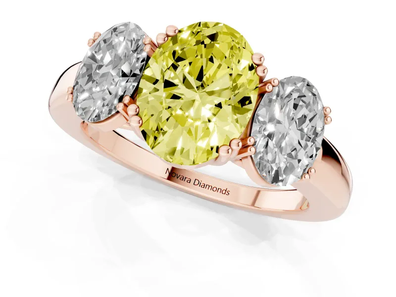 Fancy Yellow Oval Cut Diamond Three-Stone Ring Set in Rose gold with Polished Band and Prong Setting