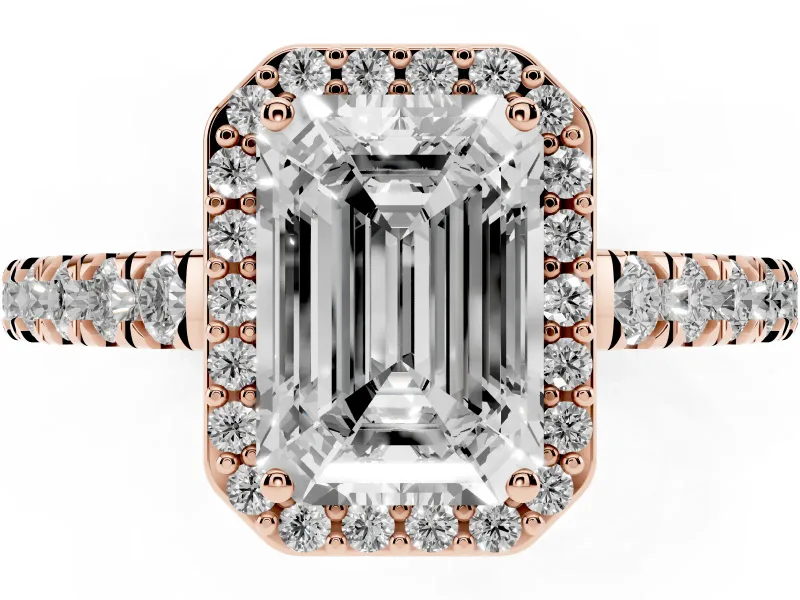 Emerald Cut Diamond Halo Engagement Ring Set in Rose gold with Pavé Band and Prong Setting