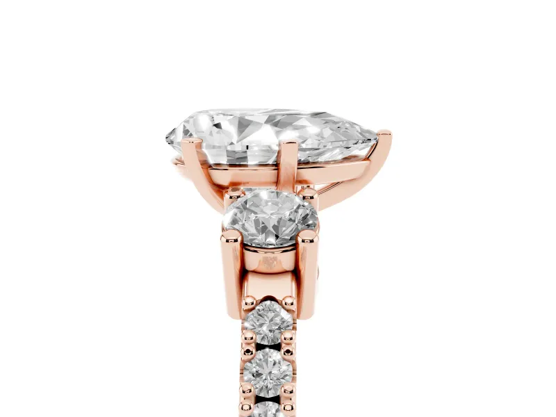 Pear-Shaped Three Stone Pavé Engagement Ring Setting | Round Side Stones | Rose Gold