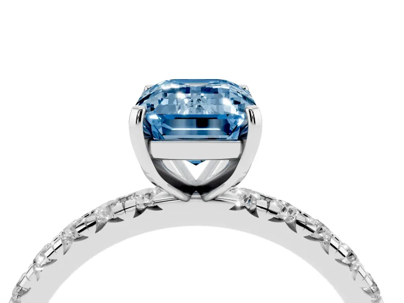 Fancy Blue Emerald Cut Diamond Pavé Solitaire Ring Set in Silver with Round Band and Prong Setting