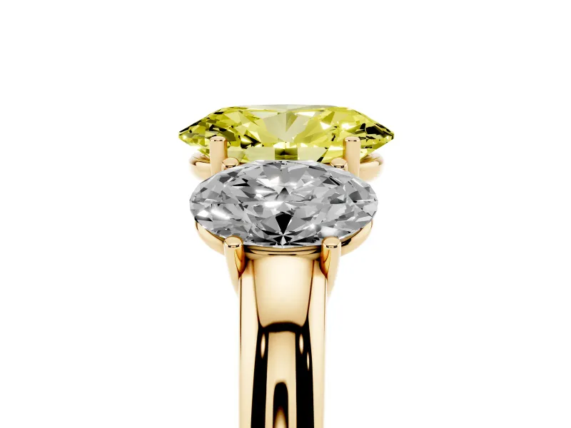 Fancy Yellow Oval Cut Diamond Three-Stone Ring Set in Yellow gold with Bold Center and Classic Band