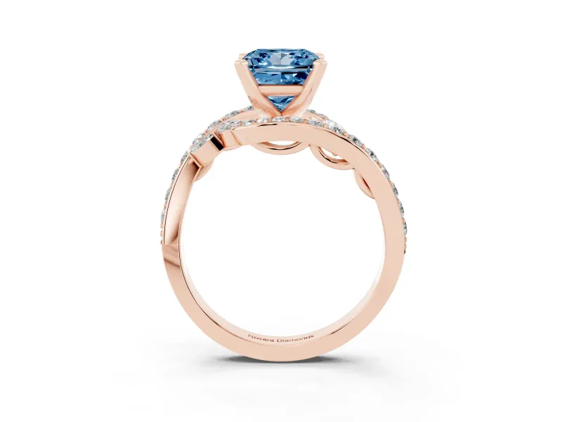 Fancy Blue Princess Cut Diamond Solitaire Ring Set in Rose gold with Pavé Twist Band and Secure Prong Setting