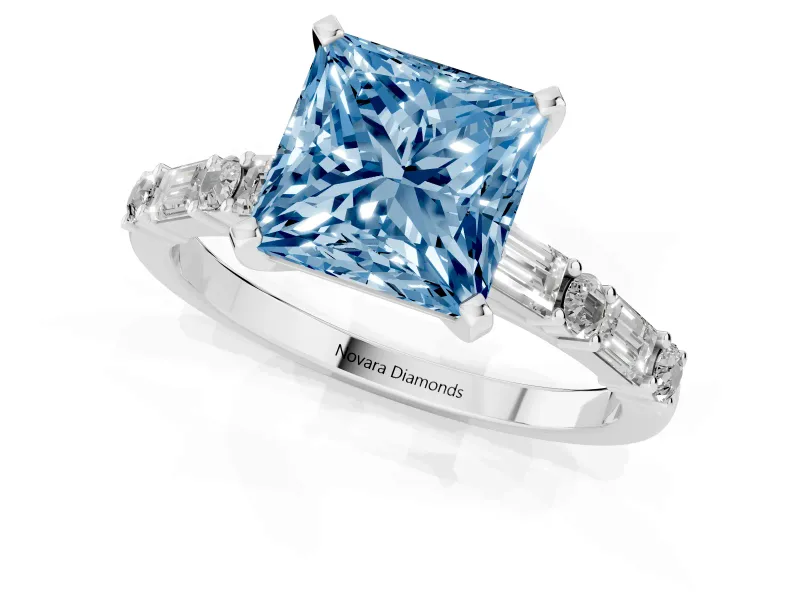 Fancy Blue Princess Cut Diamond Solitaire Set in Silver with Side Baguettes and Channel Set Band