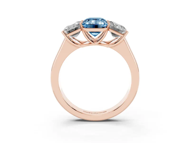 Emerald Cut Three Stone Engagement Ring Setting for a Fancy Blue Lab-Grown Diamond | Basket Prong Heads | Rose Gold