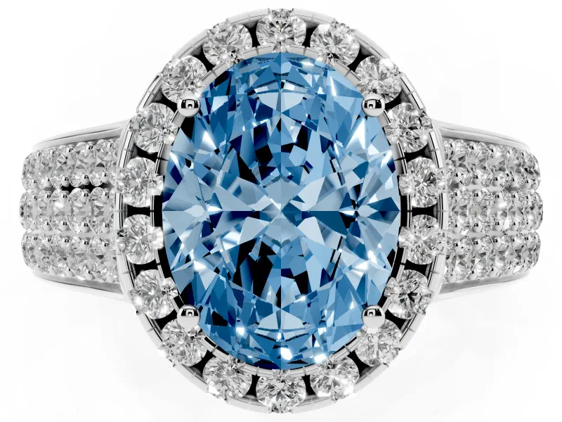 Fancy Blue Oval Cut Diamond Halo Ring Set in White gold with Pavé Band and Raised Center Setting
