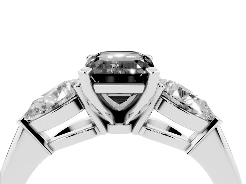 Fancy Black Three-Stone Emerald Cut Diamond Ring Set in White gold with Pear Side Stones and Prong Setting