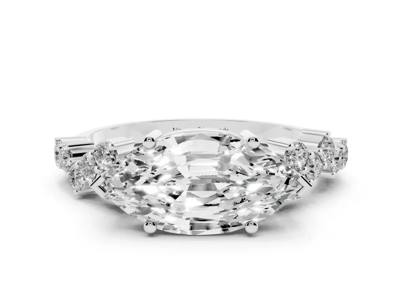 Marquise Cut Diamond Ring Set in Silver with Scattered Round Accents